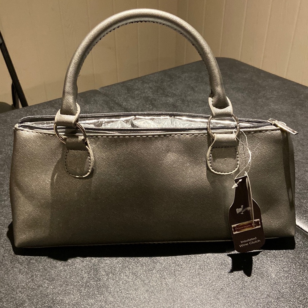 Not your average clutch bag ladies! New with tags!